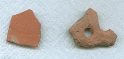 Pieces of red clay pottery.