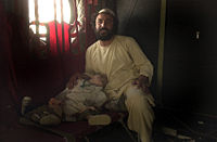A Pashtun man and his son from southern Afghanistan.