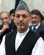 President of Afghanistan Hamid Karzai wearing his traditional Pashtun clothes and a karakul hat in 2003.