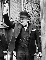 Winston Churchill giving his famous 'V' sign standing for "Victory".