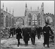 Winston Churchill walks through the ruins of Coventry Cathedral, 1941