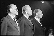 Celebrating the signing of the Camp David Accords, a key foreign policy issue of the Carter presidency: Menachem Begin, Jimmy Carter and Anwar Sadat, 1978.