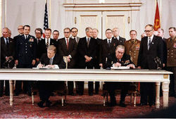 President Jimmy Carter and Soviet General Secretary Leonid Brezhnev sign the Strategic Arms Limitation Talks (SALT II) treaty, June 18, 1979, in Vienna