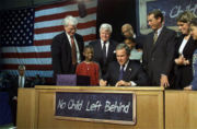 Bush signs the No Child Left Behind Act into law.