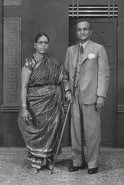 A colonial-era photograph of a Tamil couple.