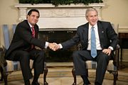 President George Bush reunites with Panamanian president Martin Torrijos.