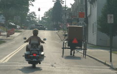 Modern and Amish transportation in Pennsylvania.