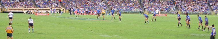 Western Force (Blue) kicking off to the New South Wales Waratahs (White).