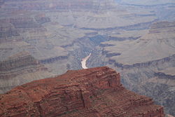A view of the Colorado River flowing through the Grand Canyon.