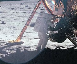Armstrong works at the Apollo Lunar Module in one of the few photos showing him during the EVA.