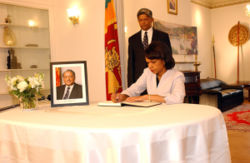 United States Secretary of State Condoleezza Rice signing the Condolence Book for Lakshman Kadirgamar