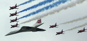 The Red Arrows escort Concorde at the Queen's Golden Jubilee flyover of London