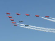 The Red Arrows in formation with two Supermarine Spitfire PRXIX's at RIAT 2005