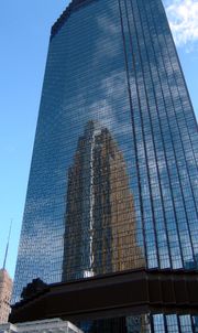 The IDS Tower, designed by Philip Johnson and the state's second tallest building, reflecting César Pelli's Art Deco-style Wells Fargo Center