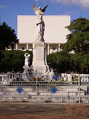 Monument of Ruben Dario, and in the background the Rubén Dario National Theatre.