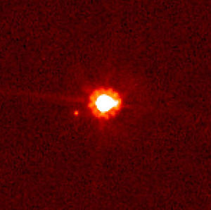 Eris, the largest known scattered disc object (centre), and its moon Dysnomia (left of object)