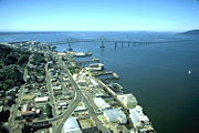 The mouth of the Columbia is just past Astoria, Oregon; ships must navigate the treacherous Columbia Bar (near horizon, not visible in this picture) to enter or exit the river.