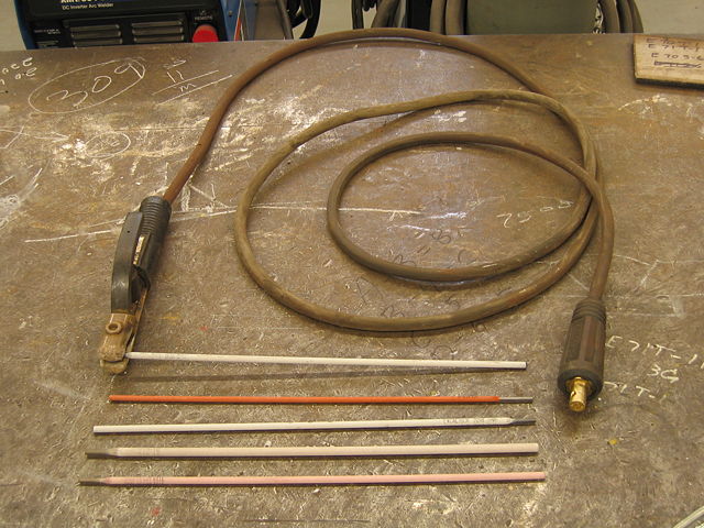 Image:Arc welding electrodes and electrode holder.triddle.jpg