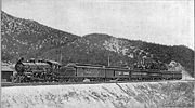 Santa Fe's California Limited pauses at the summit of Cajon Pass in 1908.