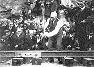 J.D. Spreckels drives the "golden spike" to ceremonially complete the San Diego and Arizona Railway on November 15, 1919.