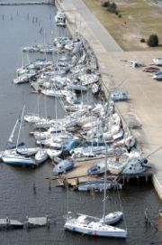 Hurricane Ivan sank and stacked numerous boats at Bayou Grande Marina at NAS Pensacola.