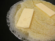 When heated, butter quickly melts into a thin liquid.