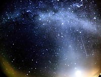 Orionid meteor striking the sky below the Milky Way and to the right of Venus. Zodiacal light is also seen at the image.