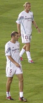 Beckham (right) and Zinedine Zidane at Real Madrid