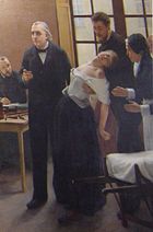 Jean-Martin Charcot (1825–1893) was a French neurologist and professor who bestowed the eponym for Tourette syndrome on behalf of his resident, Georges Albert Édouard Brutus Gilles de la Tourette.  Charcot is shown here during a lesson with a "hysterical" woman patient at the Salpêtrière hospital.