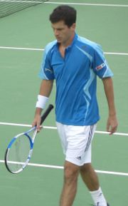 Tim Henman during the first round of the 2006 Australian Open, playing Dmitry Tursunov.