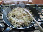 Onions cooked in a frying pan