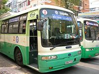 City buses in Ho Chi Minh City. Usual fare is 3000 dong.