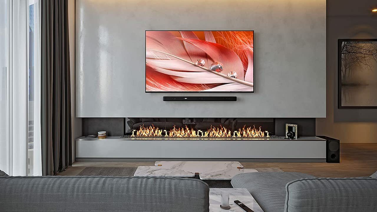 Sony HT-G700 soundbar mounted above living room fireplace
