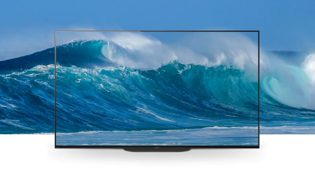 background photo of a wave blending in with sony tv's screensaver of a wave