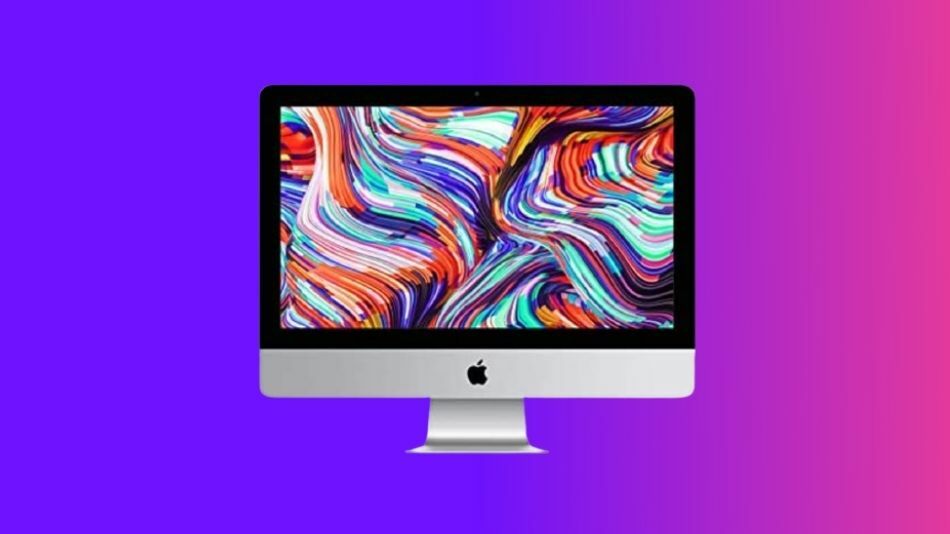 iMac against a colorful ombre background