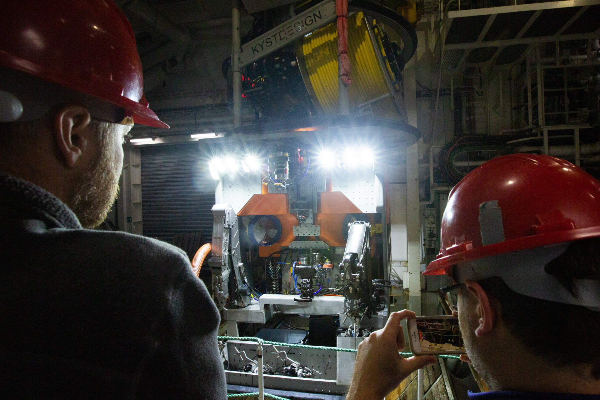 The robotic explorer "Aurora" on the vessel (background).