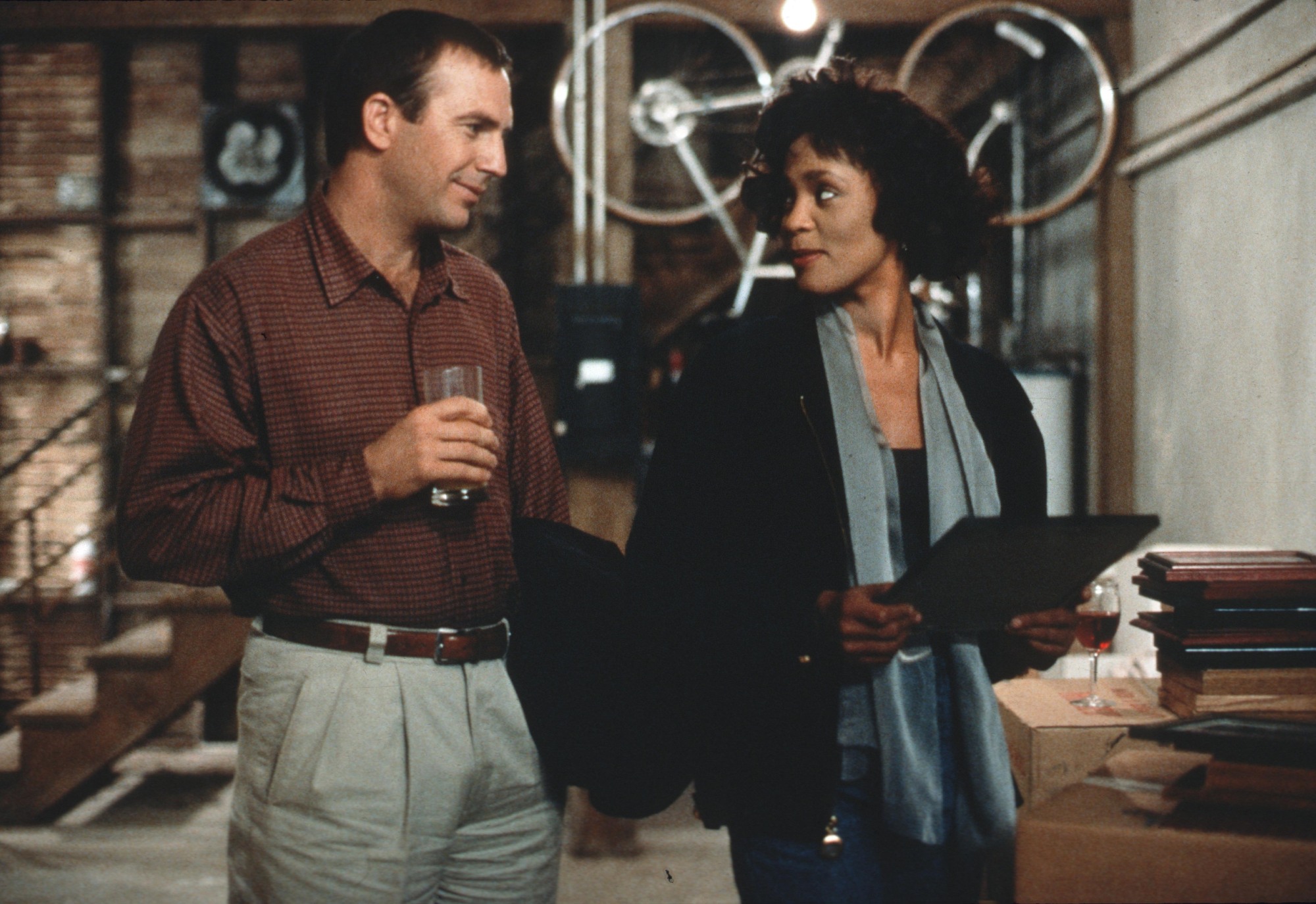 Kevin Costner and Whitney Houston fall hard in "The Bodyguard ."