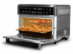 Toaster oven with fried chicken, fries, and pizza inside
