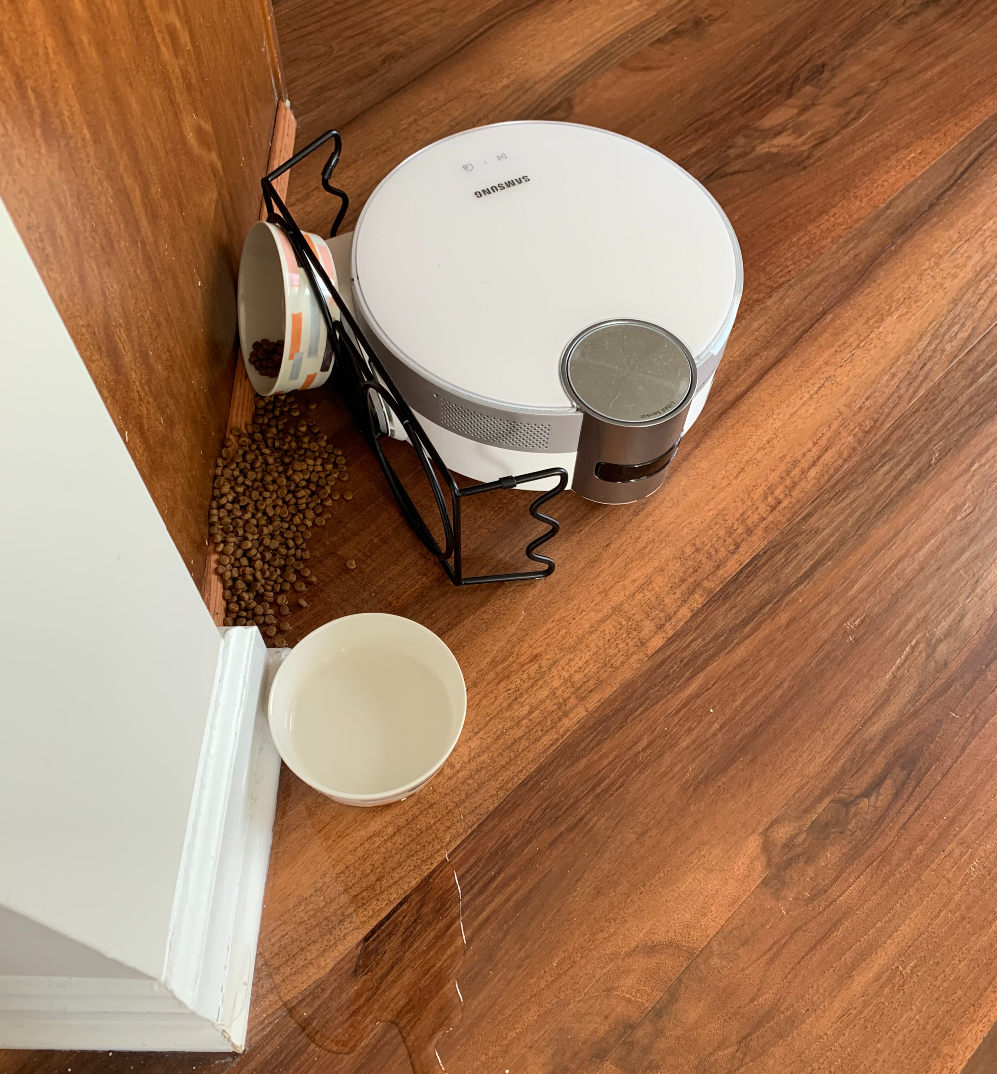 The Jet Bot AI+ knocked over bowls of cat food and water instead of sensing and avoiding them.