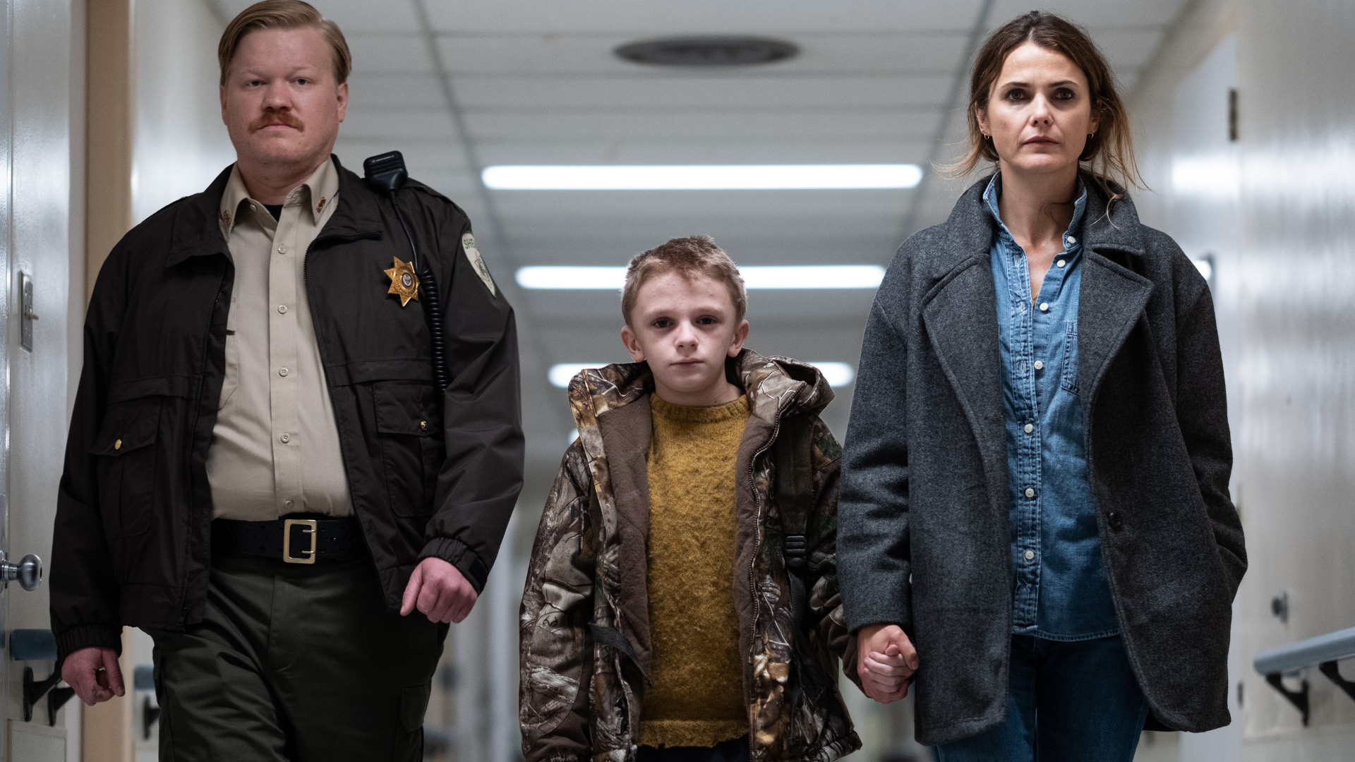 Jesse Plemons (right), Jeremy T. Thomas (middle), and Kerri Russell (left) in 'Antlers'.