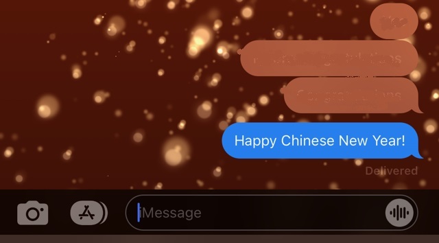 "Happy Chinese New Year!" on a backdrop of confetti