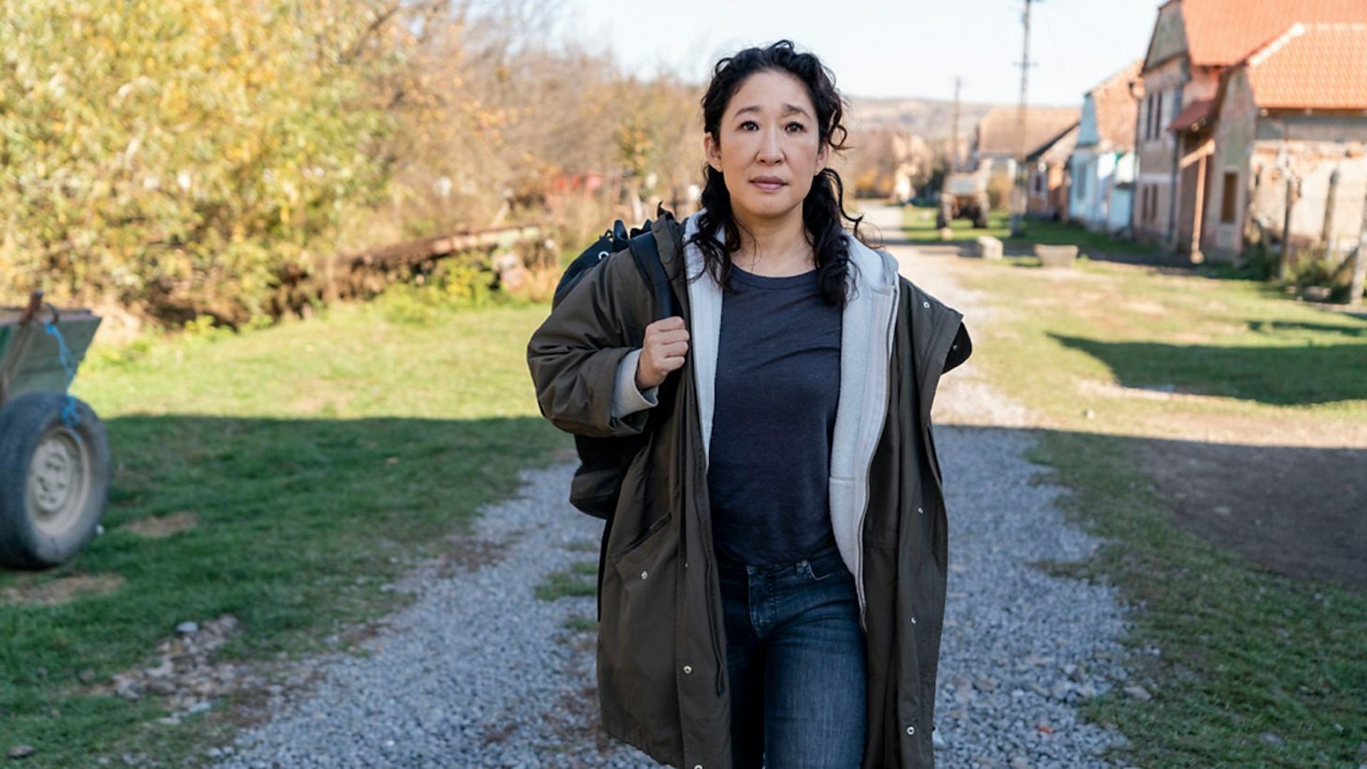 An image of Sandra Oh walking along a path in "Killing Eve."
