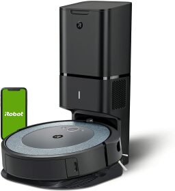 Black robot vacuum at rectangular charging station