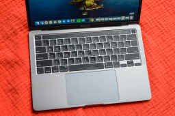 MacBook Pro laptop sitting on a red blanket