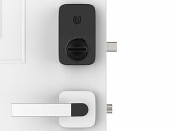 Door handle below black smart lock