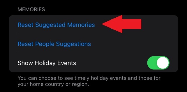 Arrow showing option to "Reset Suggested Memories"