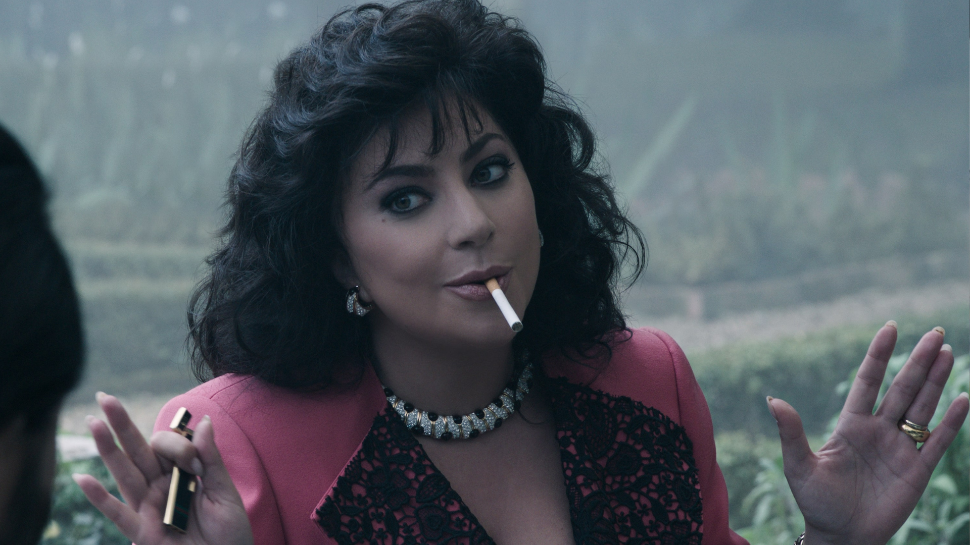 Lady Gaga smoking a cigarette in "House of Gucci."