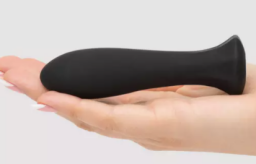 a hand holding the bullet vibrator