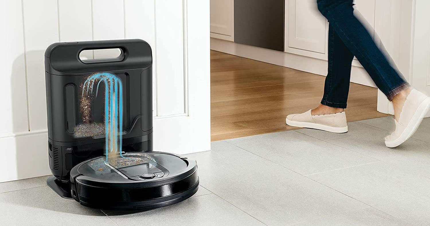Robot vacuum emptying itself into the base