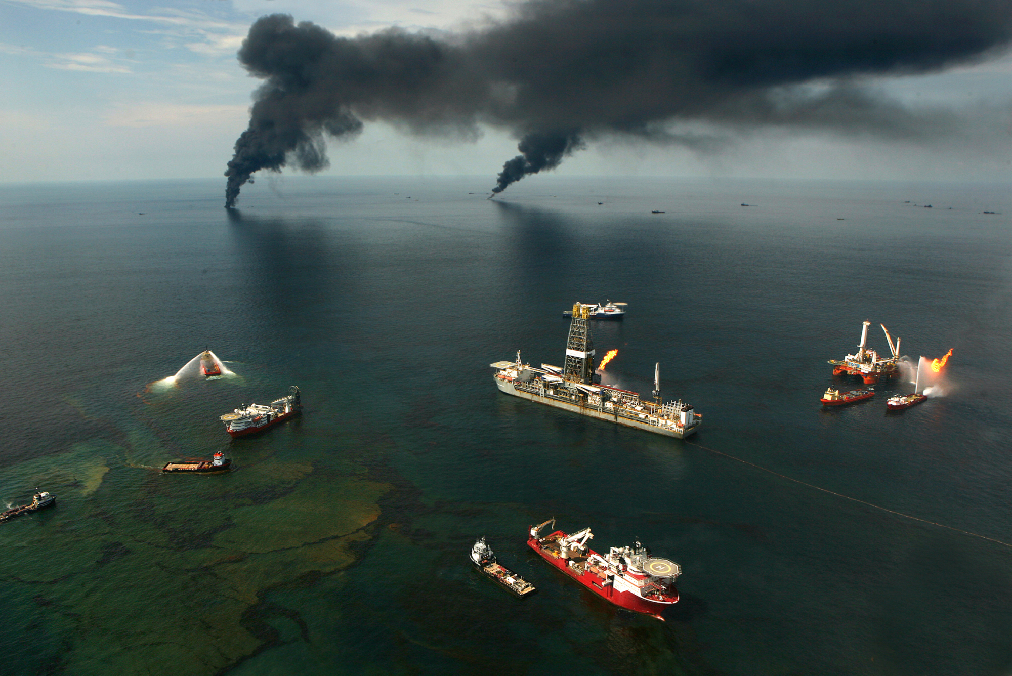 Controlled oil burns in the Gulf of Mexico as part of the clean-up efforts.